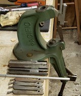 Reloading Package. All American 4 station reloading turret press. RCBS and Pacific Single stage reloading presses. Lyman/Ohaus D-5 Scale. Die Sets. - 3 of 7