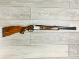 BLASER BBF 97 COMBINATION GUN 12 GAUGE/.243 WIN. OVER/UNDER SHOTGUN-RIFLE - 1 of 13