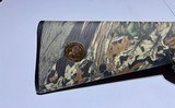Mossberg 702 Plinkster 22lr camo synthetic stock rifle - NWTF logo - 2 of 8