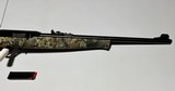 Mossberg 702 Plinkster 22lr camo synthetic stock rifle - NWTF logo - 5 of 8