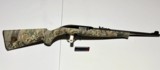 Mossberg 702 Plinkster 22lr camo synthetic stock rifle - NWTF logo - 1 of 8