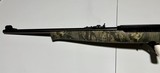 Mossberg 702 Plinkster 22lr camo synthetic stock rifle - NWTF logo - 8 of 8