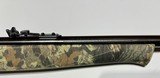 Mossberg 702 Plinkster 22lr camo synthetic stock rifle - NWTF logo - 4 of 8