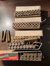 REMINGTON.
/.
WINCHESTER.
32-40.
And
AMMO. AND. BRASS - 1 of 8