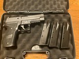 SIG. MK-25.9MM.LIKE. NEW.WITH. 3. 15. ROUND. MAGS.AND CASE. - 1 of 6