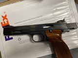 S&W Model 41,22lr SN#A797304,match target auto pistol,99% conc in orig factory box,papers ,numbered to gun,5 in barr - 5 of 15
