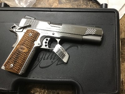 Kimber Stainless Raptor,5 in barrel,45acp,fixed night sights 3 dot,New In factory box,papers,UNfired