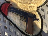 Browning Hi Power, 9mm T series,Belgium made,fixed sights, never fired with Browning pouch