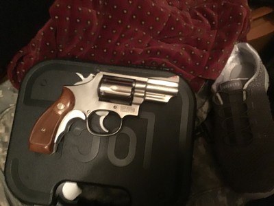 Smith & Wesson model 66-2,357 magnum,2 1/2 barrel,stainless, TT,TS, red ramp site,NIB,orig grips,99,9%