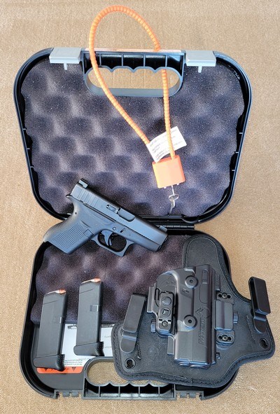 Glock G42 sub-compact .380 semi - auto