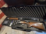 FAIR CARRERA 20GA PORTED
BARRELS Fabbrica Armi Isidoro Rizzini WITH 6 CHOKE TUBES VENTED SIGHT RIB