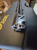 KOLAR SPORTING 12GA HAS A 32 INCH BARREL AND A 30 INCH CARRIER BARREL WITH KOLAR TUBES SKEET 410 20 AND 28GA