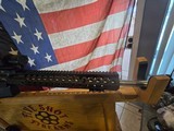 RUGER 204 WITH PSA LOWER A WILSON COMBAT 18 INCH FLUTED BARREL AND RAIL WITH A COLT SCOPE MOUNT and a vortex STRIKE EAGLE SCOPE - 4 of 12
