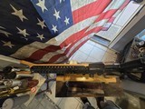 RUGER 204 WITH PSA LOWER A WILSON COMBAT 18 INCH FLUTED BARREL AND RAIL WITH A COLT SCOPE MOUNT and a vortex STRIKE EAGLE SCOPE - 11 of 12