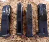 4 original Beretta 92 Magazines 40 Caliber also works with 9mm will hold 12 rounds of 40cal, 15 rounds of 9mm