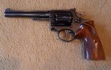 K-22 Revolver In NRA excellent condition. 6 inch barrel custom target grips - 1 of 9