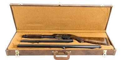 Cased and Engraved & Gold Inlaid 12 Gauge Ithaca Model 37 L.A.P.D. 200th Anniversary Commemorative Slide Action Shotgun with extra 18 1/2-inch barrel.
