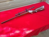 C. Sharps Low Wall, 22 LR with scope - 1 of 9