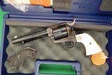 Colt SAA, 3rd Genertion, 44-40, Ivory Grips, New in box - 1 of 5