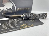 Microtech HERA S/E Two-Toned Black w/ Gold 'Source' Artwork - 1 of 1