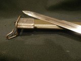 US MODEL 1918 MARK I TRENCH KNIFE
WWII PROTOTYPE
M1 GARAND BLADE w/ EXTENDED POMMEL SPIKE
OD GREEN
w/SCABBARD - 10 of 15