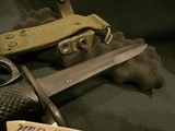 US M7 BAYONET WITH KNUCKLE GUARD.
US M7 M-16 KNUCKLE KNIFE.
US M7 BAYONET WITH KNUCKLE GUARD.
US M7 KNUCKLE GUARD BAYONET.
US M-16 KNUCKLE KNIFE - 11 of 15