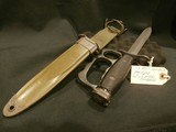 US M7 BAYONET WITH KNUCKLE GUARD AND USM8A1 SCABBARD.
US M7 M-16 KNUCKLE KNIFE.
US M7 BAYONET WITH KNUCKLE GUARD.
US M7 KNUCKLE GUARD BAYONET.
UD