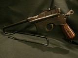 ASTRA 900 FINNISH SPECIAL-ORDER 9MM CALIBRE WITH 160MM BARREL. ALL-MATCHING. CARVED & NUMBERED WALNUT STOCK. EXTREMELY RARE!!