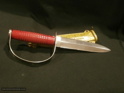PUMA FROGMAN DIVE KNIFE 6334
RED GRIP WITH GOLD SCABBARD ...MINT!!