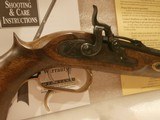 TRADITIONS TRAPPER PISTOL PERCUSSION .50 CALIBER P1100
PERCUSSION .50 CAL PISTOL
TRADITIONS .50 CAL PERCUSSION PISTOL
TRADITIONS MODEL P1100 - 3 of 12