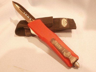 MICROTECH AUTOMATIC COMBAT TRODEN OTF AUTOMATIC FIGHTING KNIFE...RED GRIP................CLONE!!! - Image 7 of 9