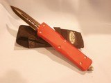 MICROTECH AUTOMATIC COMBAT TRODEN OTF AUTOMATIC FIGHTING KNIFE...RED GRIP................CLONE!!! - Image 5 of 9