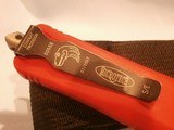 MICROTECH AUTOMATIC COMBAT TRODEN OTF AUTOMATIC FIGHTING KNIFE...RED GRIP................CLONE!!! - Image 3 of 9