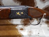 Unbelievable Hand Engraved and Gold Inlaid, 101 Pigeon PRESENTATION
Grade Gun - 3 of 17