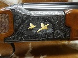 Unbelievable Hand Engraved and Gold Inlaid, 101 Pigeon PRESENTATION
Grade Gun - 10 of 17