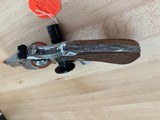 Colt Python
3 inch, new model, SS, Factory Engraved.
New in the box. - 3 of 6