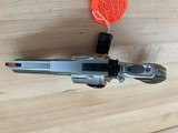 Colt Python
3 inch, new model, SS, Factory Engraved.
New in the box. - 4 of 6