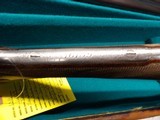 Rigby Rising BIte Shotgun made in 1890
Steel Barrels. - 18 of 25