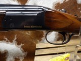 Perazzi MX3 Special.
Same as the MX8 without the scalloped reciever.