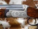 Perazzi MX8
SC3, 32Inch Mod and Full, Gorgeous wood Straight Grip