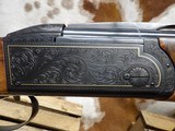 Krieghoff K-80 Sporting, Black Supersport engraving with gold wire border.32 inch sporting barrels. - 14 of 19