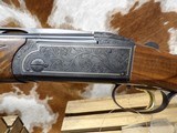 Krieghoff K-80 Sporting, Black Supersport engraving with gold wire border.32 inch sporting barrels. - 8 of 19