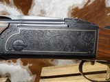 Krieghoff K-80 Sporting, Black Supersport engraving with gold wire border.
32 inch sporting barrels.