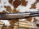 Krieghoff K-20 sporting.
standard engraving with black finish and gold line border,
30 Inch barrel.
like new in the factory case. - 5 of 14