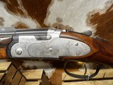 Beretta 687 EELL Diamond Pigeon,
30 inch over under and 32 inch top single.