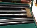 WINCHESTER MODEL 21,Engraved by Bill Mains, Wood by Tom Smith and 20 gauge and one 28 gauge barrel - 10 of 25