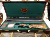 WINCHESTER MODEL 21,Engraved by Bill Mains, Wood by Tom Smith and 20 gauge and one 28 gauge barrel - 1 of 25