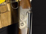 Caeser Guerini Challenger Sporting
30 inch barrel Giovenelli Engraved. - 12 of 13