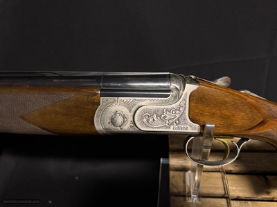 Caeser Guerini Challenger Sporting
30 inch barrel Giovenelli Engraved.