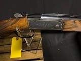 Krieghoff K-20 sporting.
standard engraving with black finish and gold line border,
30 Inch barrel.
like new in the factory case. - 12 of 12